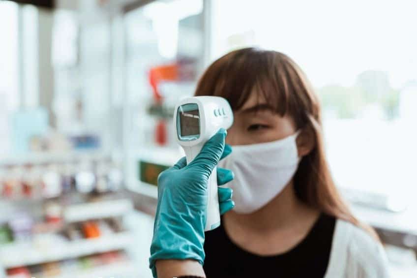 person getting temperature taken