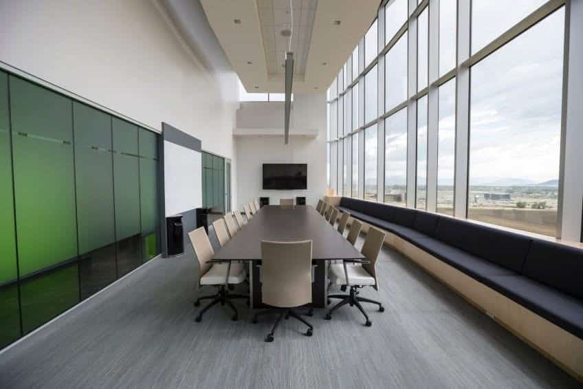 Upgrade meeting room with table and tv