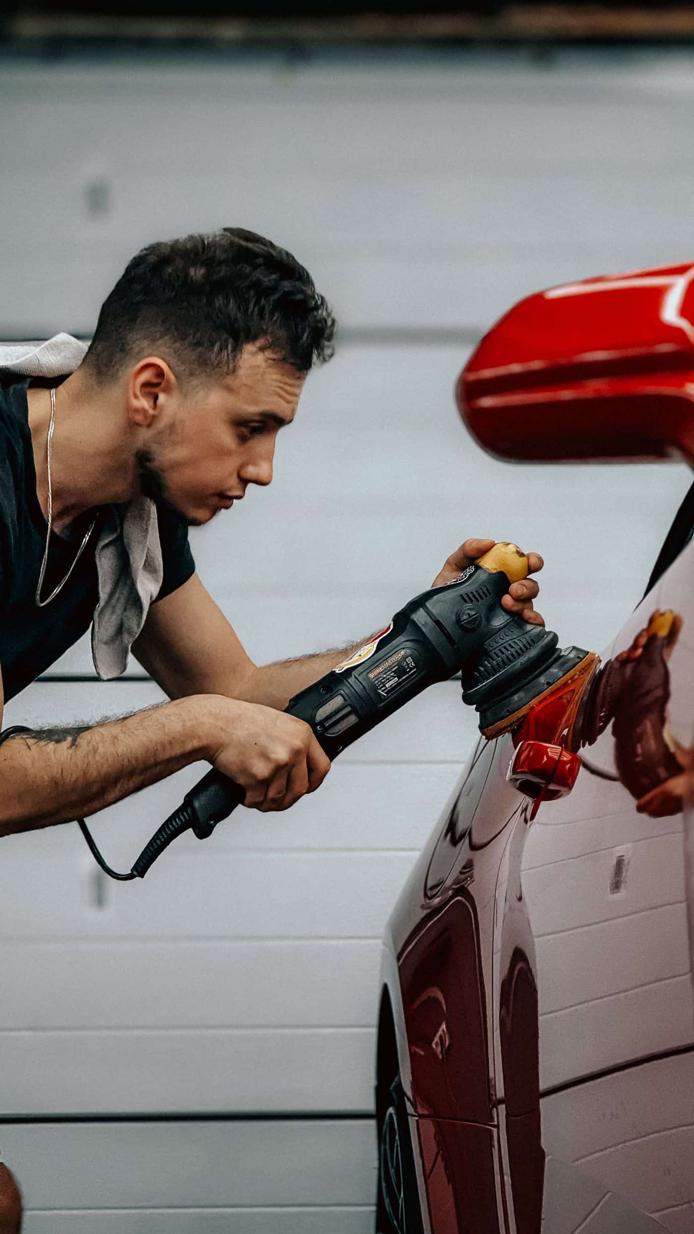 technician preparing car paint before PPF