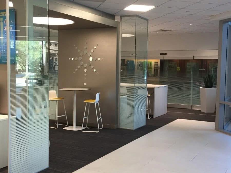 Striped gradient decorative window film accents in office