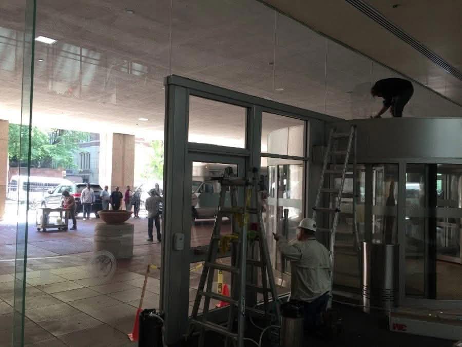 8 mil 3M security window film installation on commercial building in Baltimore MD